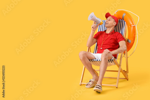 Male lifeguard with rescue ...