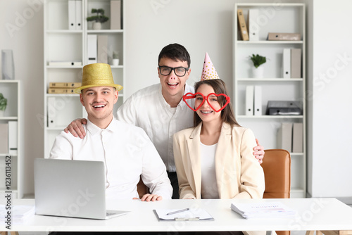 Young colleagues with funny...