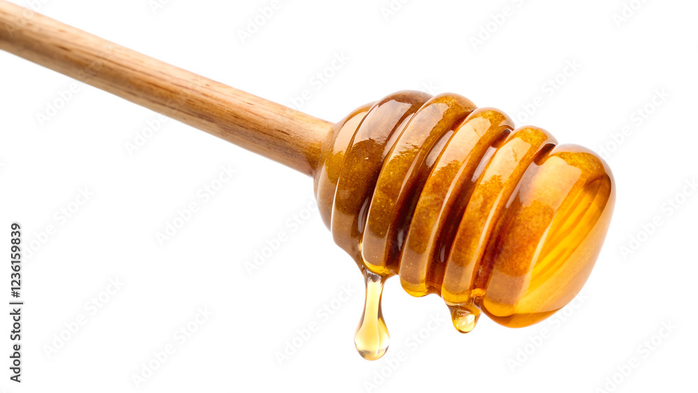 honey dripping from wooden dipper