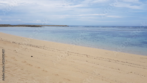empty beach in the afternoon with clear blue sky