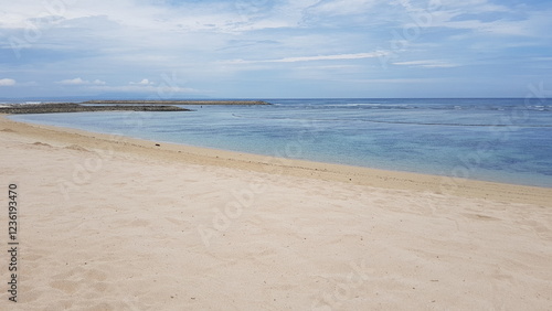 empty beach in the afternoon with clear blue sky