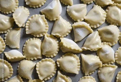 Assorted Frozen Dumplings and Ravioli on Rustic Background photo