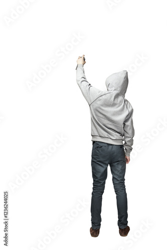 Wallpaper Mural Person wearing a gray hoodie and dark pants holding an object, standing with back turned. Isolated on white background. Concept of urban lifestyle Torontodigital.ca
