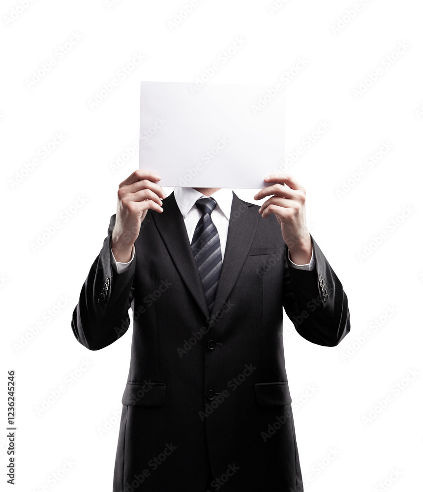 Man in a suit holding blank paper in front of face, standing against white background. Professional concept of anonymity or advertising template Man in a suit holding blank paper in front of face, standing against white background. Professional concept of anonymity or advertising template