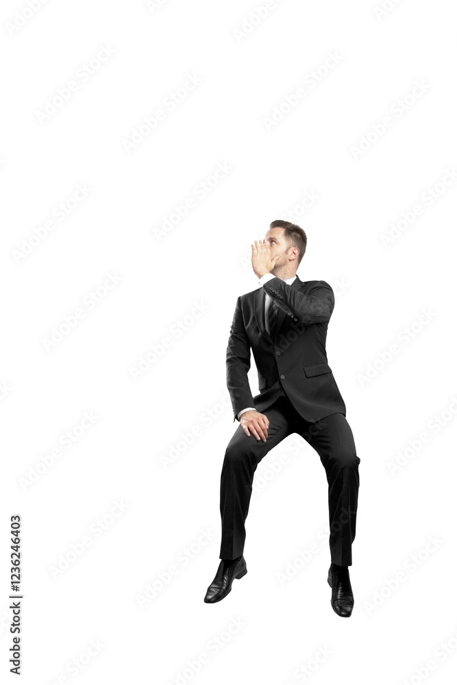 Businessman sitting in formal attire, hand near mouth as if shouting, isolated on a clean white background. Concept of communication or announcement Businessman sitting in formal attire, hand near mouth as if shouting, isolated on a clean white background. Concept of communication or announcement