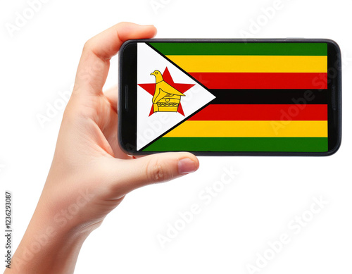 ジンバブエの国旗が画面に表示されているスマートフォンを持つ手。白背景。(Hand holding smartphone, screen is Zimbabwe flag. on white background.)
