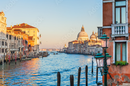 Grand Canal and Basilica Santa Maria della Salute in Venice, Italy. Beautifil cityscape at sunset. photo