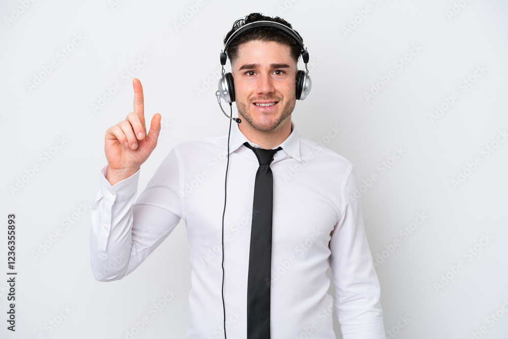Telemarketer caucasian man isolated on white background pointing up a great idea Telemarketer caucasian man isolated on white background pointing up a great idea