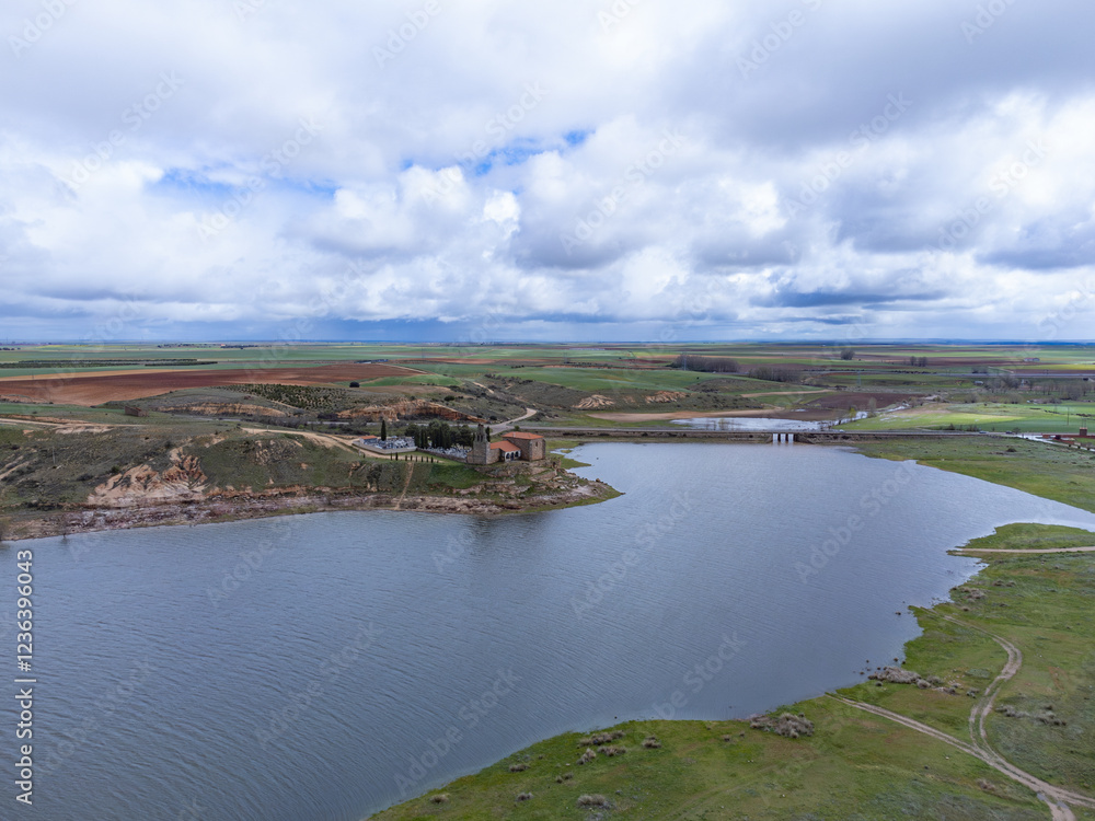Fototapeta premium aerial photo of the hermitage of the Virgin of the Castle and the Ricobayo reservoir in Montamarta (Zamora). Spain