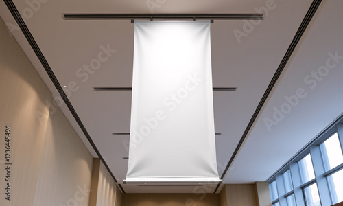 Ultra-realistic mock-up of a vertical banner with a blank design hanging in a well-lit conference hall