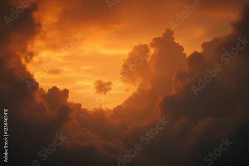 Fiery Sunset Sky: Dramatic Cumulus Clouds Illuminated by Golden Hour Light