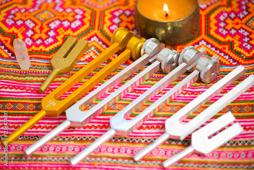 tuning fork on a fabric.