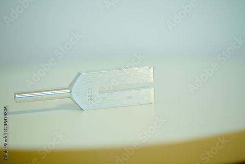 tuning fork on a fabric.
