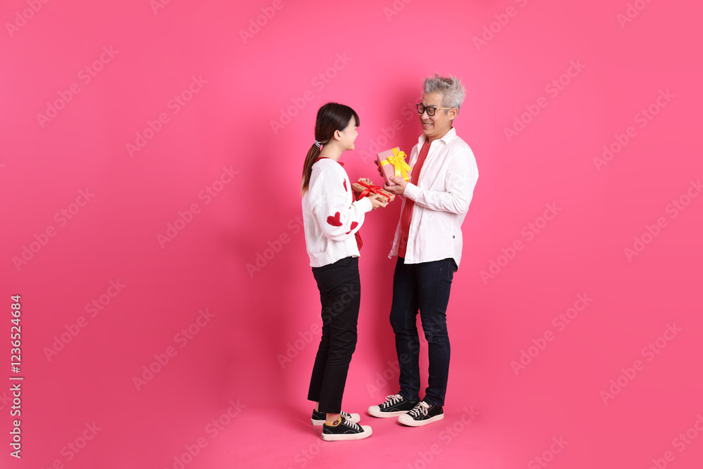 Fototapeta premium man and woman in red clothes