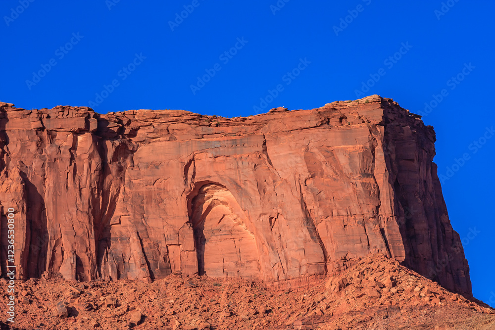 A large rock formation with a hole in the middle A large rock formation with a hole in the middle