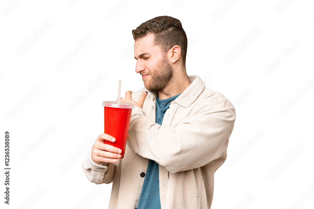 Young handsome blonde man holding soda over isolated chroma key background suffering from pain in shoulder for having made an effort Young handsome blonde man holding soda over isolated chroma key background suffering from pain in shoulder for having made an effort