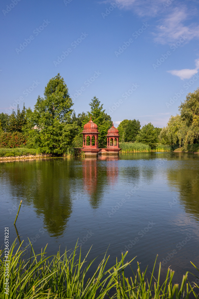 Beautiful summer evening in a park. Landscape shot in Krishna valley at sunset. Park and temple complex at Balaton, Unagrn Beautiful summer evening in a park. Landscape shot in Krishna valley at sunset. Park and temple complex at Balaton, Unagrn