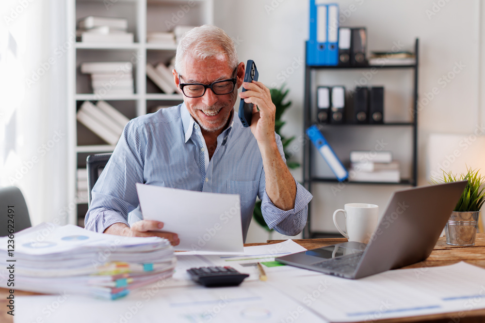 Portrait of around the age of 55s, making telephone call share good news about project working in office workplace, man planning finance concept. Portrait of around the age of 55s, making telephone call share good news about project working in office workplace, man planning finance concept.
