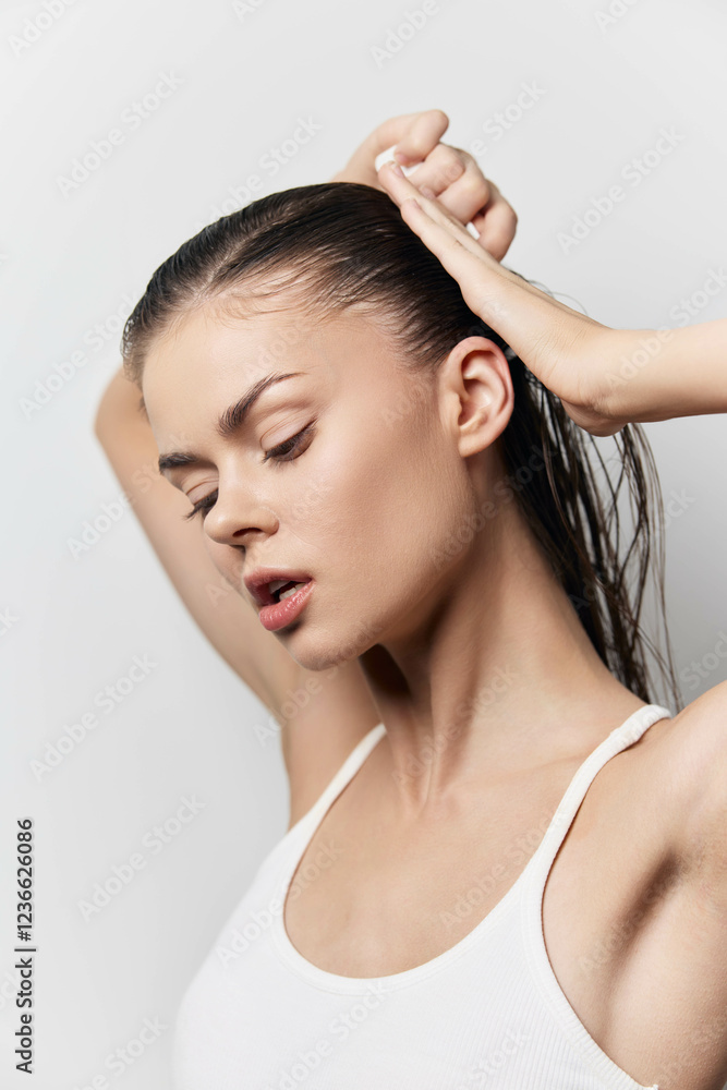 young woman with wet hair, beauty portrait, minimalistic background, showcasing skincare routine, natural beauty, soft lighting, delicate features, expressing tranquility and confidence young woman with wet hair, beauty portrait, minimalistic background, showcasing skincare routine, natural beauty, soft lighting, delicate features, expressing tranquility and confidence