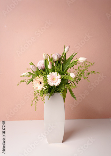 Graceful Tulip & Gerbera Arrangement in a White Ceramic Vase