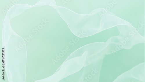 Elegant mint green chiffon fabric with soft translucent layers creating a gradient effect