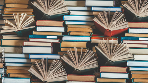 books, open books lie on the table, top view