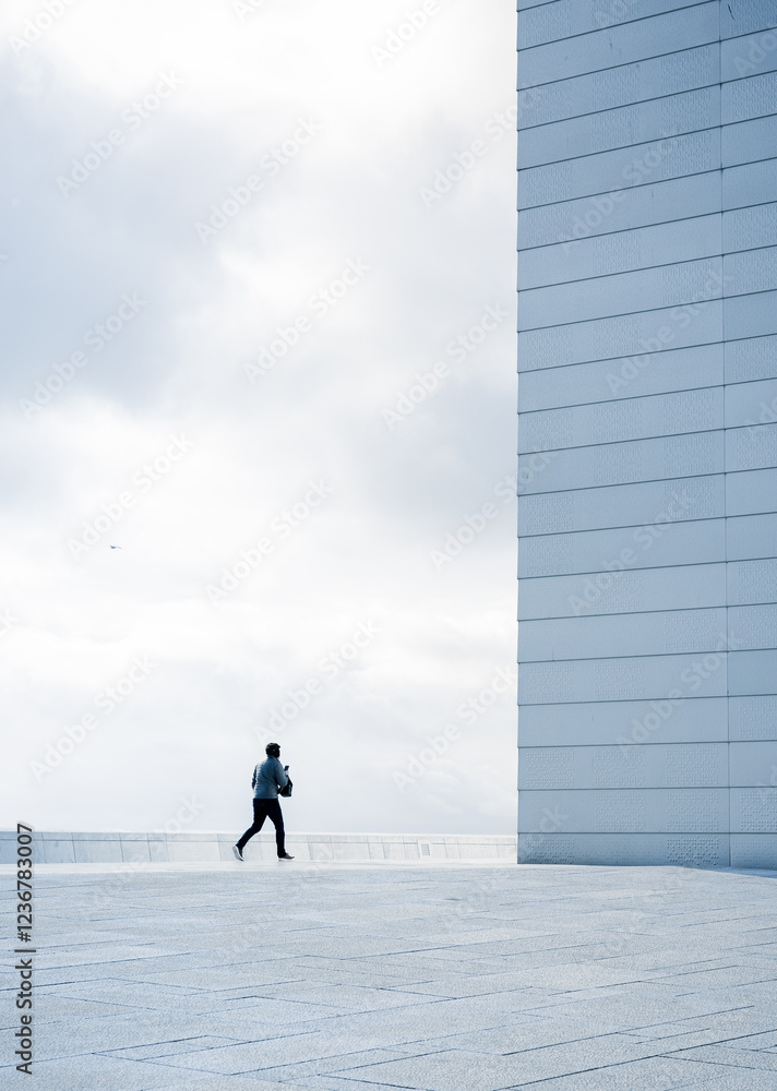 silhouette of a person moving towards a high wall silhouette of a person moving towards a high wall