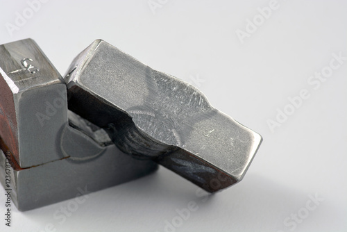 Macro etched cross-section of a butt weld Joint prepared for metallurgical examination –  analysis of welded metal structure. shows the heat-affected zone (HAZ), weld penetration, fusion boundaries.