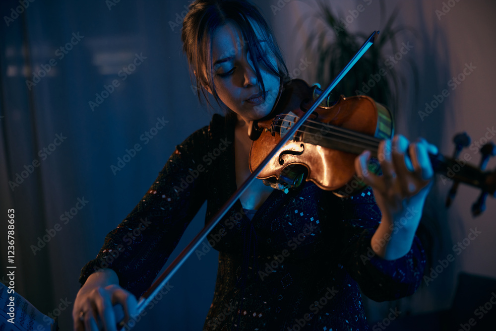 Female Violinist is Preparing for a Concert Female Violinist is Preparing for a Concert