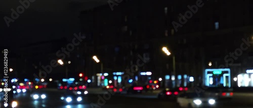 Wallpaper Mural Nighttime city traffic with glowing streetlights and moving vehicles. A vibrant urban scene showcasing the energy of a busy city at night Torontodigital.ca