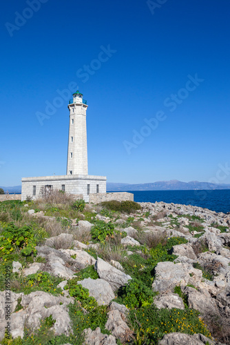 Obraz na płótnie The historic lighthouse of Kranae, Gytheio, in Laconia, Greece. A stunning maritime landmark on the rocky coastline with panoramic sea and sky views. w salonie