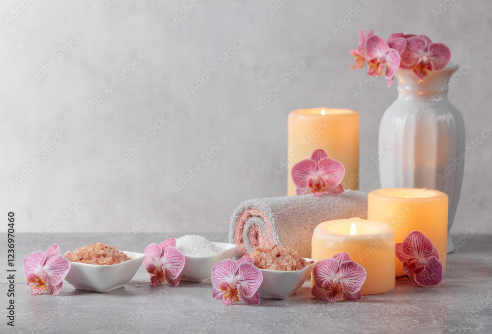 Sea salt, towels, orchid flowers, and burning candles. Sea salt, towels, orchid flowers, and burning candles.