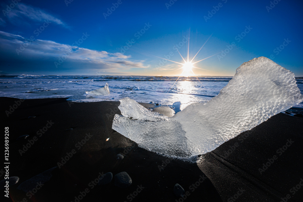 Loose segments of glacier washed out of Jokulsarlon glacial lake onto Diamond Beach on Iceland