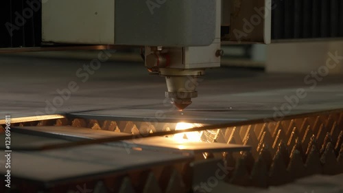 CNC Laser cutting of metal, modern industrial technology.