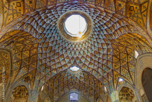 Geometrical vaults of the ceiling in building of Aminoddole caravanserai, Kashan, Iran. Caravanserai was opened in 19th century. Since then, it has been one of most interesting places in Kashan bazaar