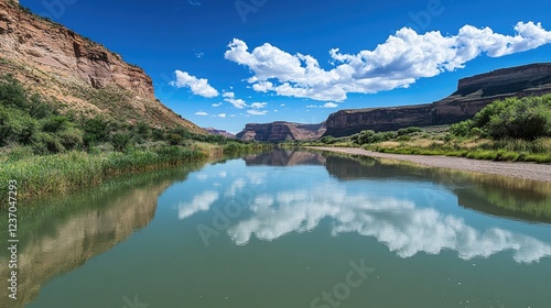 Calm River Reflecting Clouds and Canyon Walls