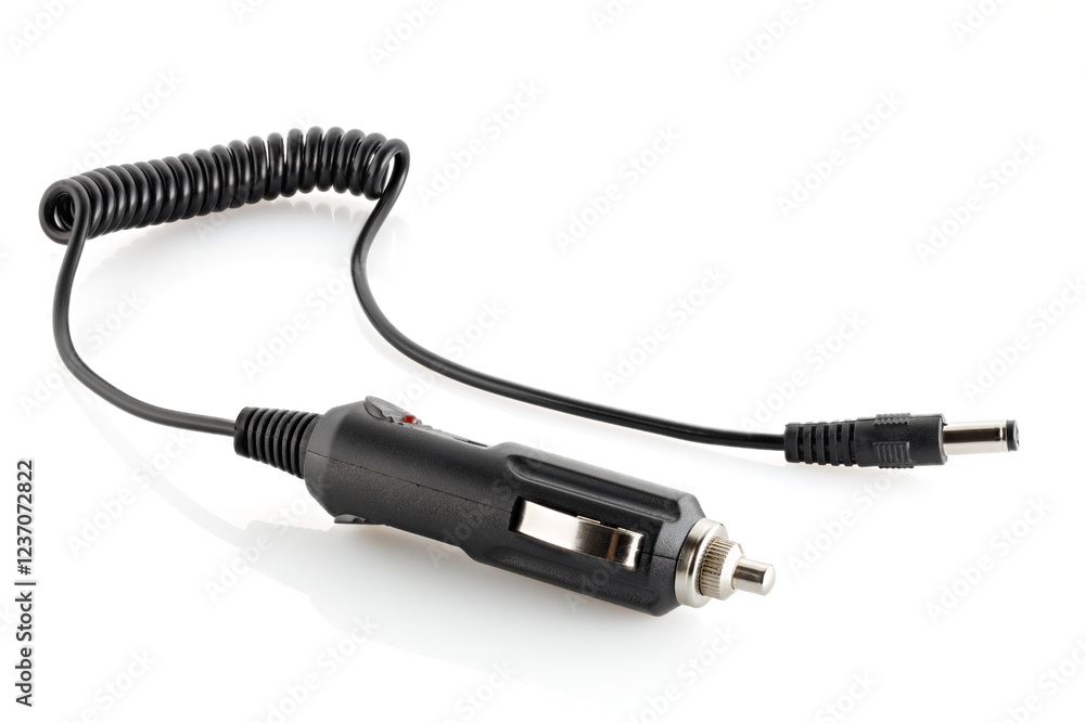 Automotive electronics. Electric adapter for charging devices into a Car cigarette lighter isolated with white background. Automotive electronics. Electric adapter for charging devices into a Car cigarette lighter isolated with white background.