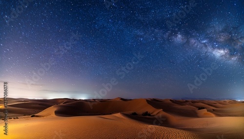 starry night within the desolate tract with dunes photo