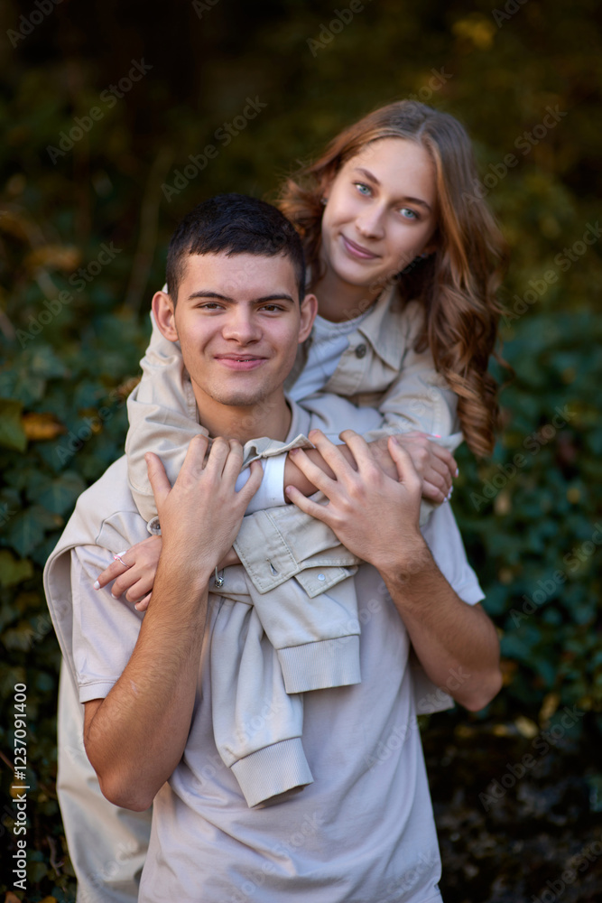 Embracing Teen Love in the Greenery of the Park. Whispers of Love: Teen Couple's Outdoor Embrace in the Park. Embracing Teen Love in the Greenery of the Park. Whispers of Love: Teen Couple's Outdoor Embrace in the Park.