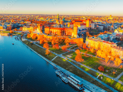Wawel castle landmark with city view near river in Krakow Poland.   Autumn landscape on coast river Wisla.