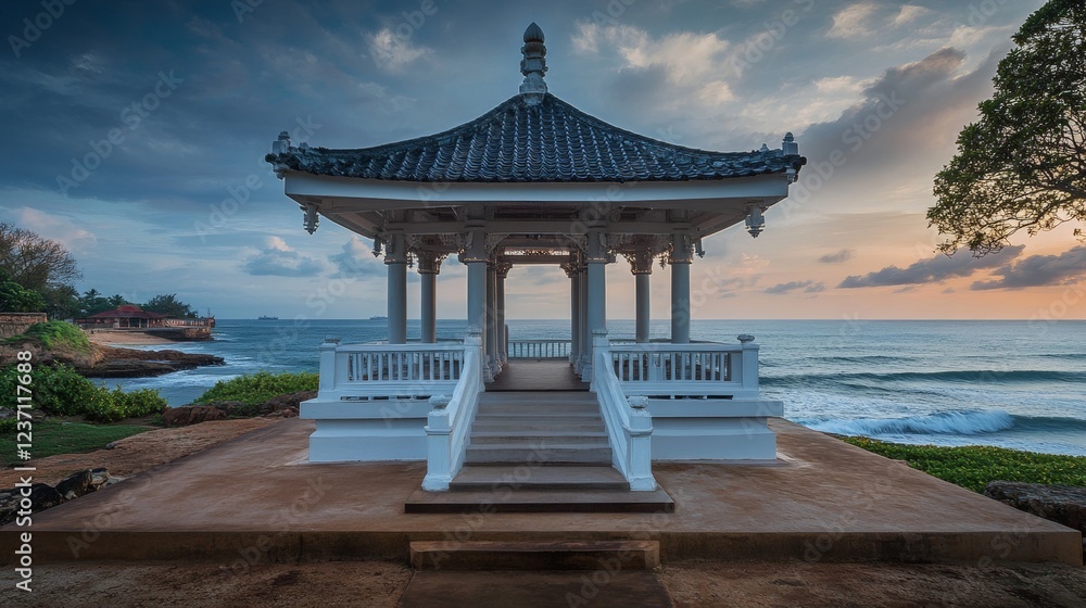 Fototapeta premium The Japanese Peace Pagoda in Rumassala, Sri Lanka is a sacred temple with stunning views of the Indian Ocean and Galle Dutch Fort.