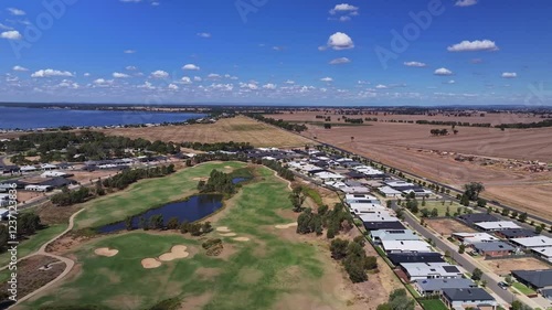 Aerial across black bull golf course with new homes and lake mulwala nearby in yarrawonga victoria australia photo