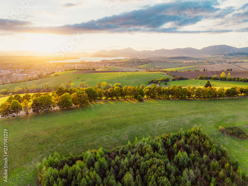 Sunset over Liptov region with Liptovska Mara lake and Tatras mountains around. Liptovsky mikulas landspace, slovakia. photo