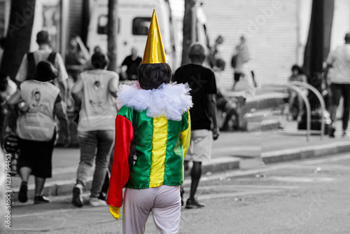 Pierrot Com o Traje, fantasia colorida circulando no Carnaval de Rua de São Paulo.  photo