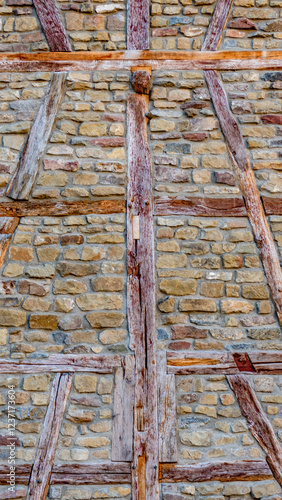 Fassade mit Mauerwerk und Fachwerkbauten photo