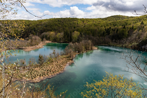 Plitvice Lakes National Park in Croatia, beautiful lakes and waterfalls between the green forest  photo