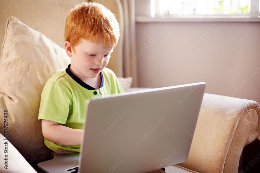 Typing, serious and child with laptop, home and elearning for education of boy, growth and development. House, studying and knowledge for kid with assignment, online and tech for digital literacy Typing, serious and child with laptop, home and elearning for education of boy, growth and development. House, studying and knowledge for kid with assignment, online and tech for digital literacy
