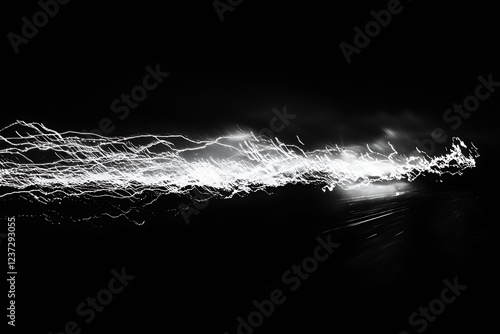 Lightning bolts streaking across a dark sky during a nighttime storm, illustrating the power natural energy. photo