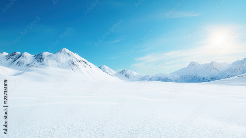 Fototapeta premium serene snow covered landscape with mountains under clear blue sky, evoking sense of tranquility and vastness