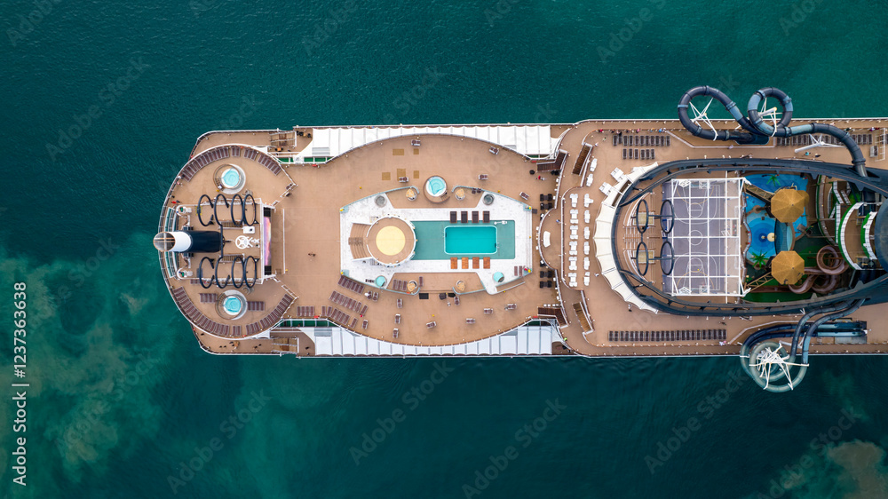 Αυτοκόλλητο Aerial view top down of stern upper deck of luxurious cruise ship with swimming
